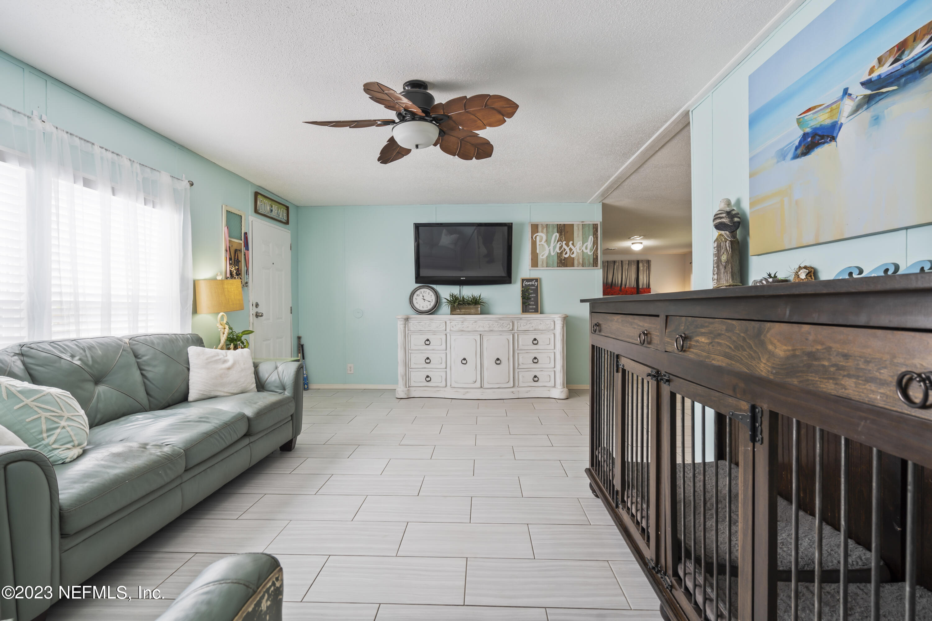 198 Yellow Water Road Baldwin, FL 32234 - Photo 5 of 37 a living room with furniture and kitchen view