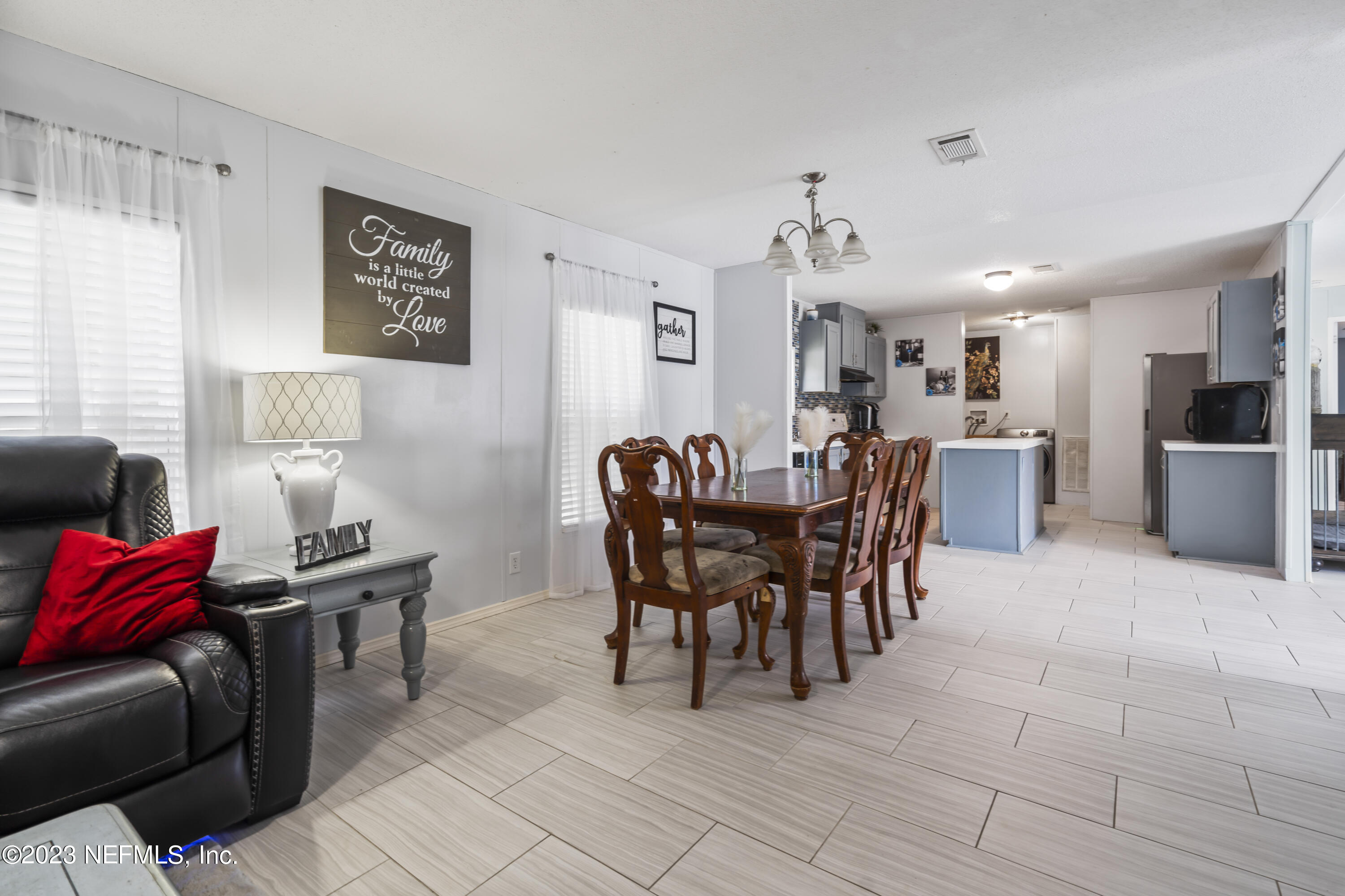 198 Yellow Water Road Baldwin, FL 32234 - Photo 8 of 37 a view of a dining room with furniture
