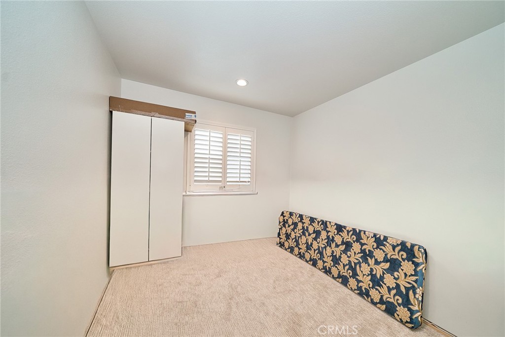 7902 Ravello Court Highland, CA 92346 - Photo 29 of 52 a view of an empty room and window