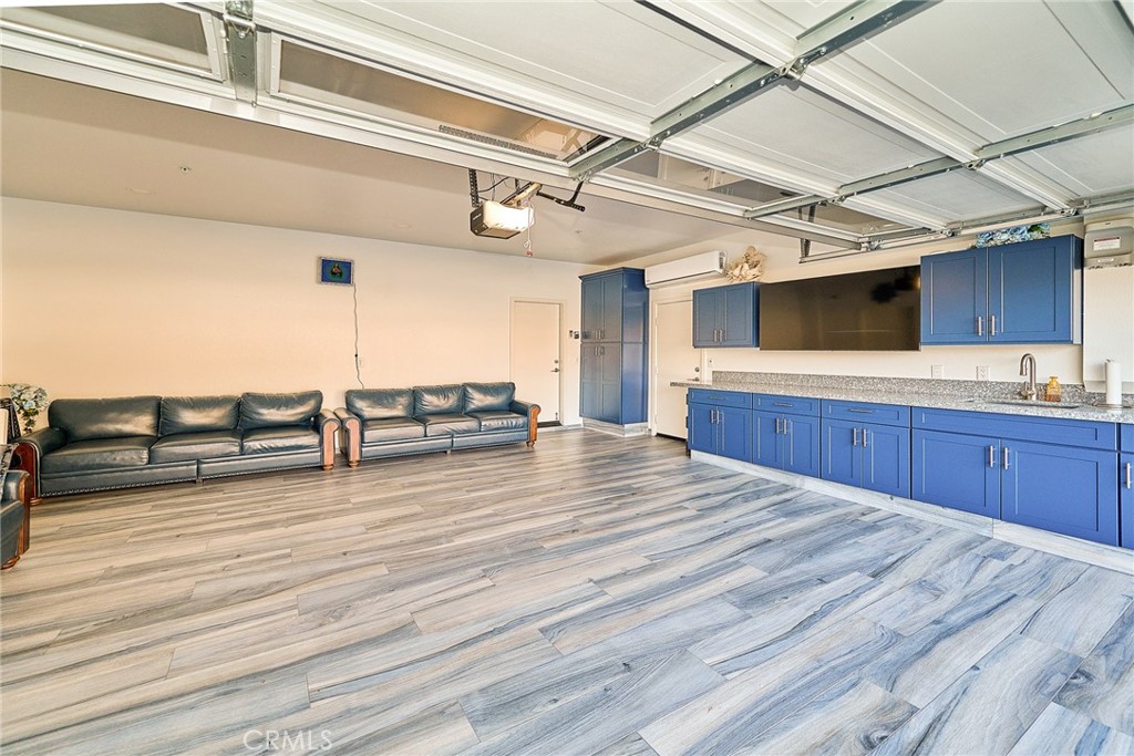 7902 Ravello Court Highland, CA 92346 - Photo 37 of 52 a view of a room with wooden floor and staircase