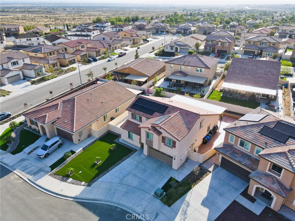 7902 Ravello Court Highland, CA 92346 - Photo 48 of 52 an aerial view of a house with a garden