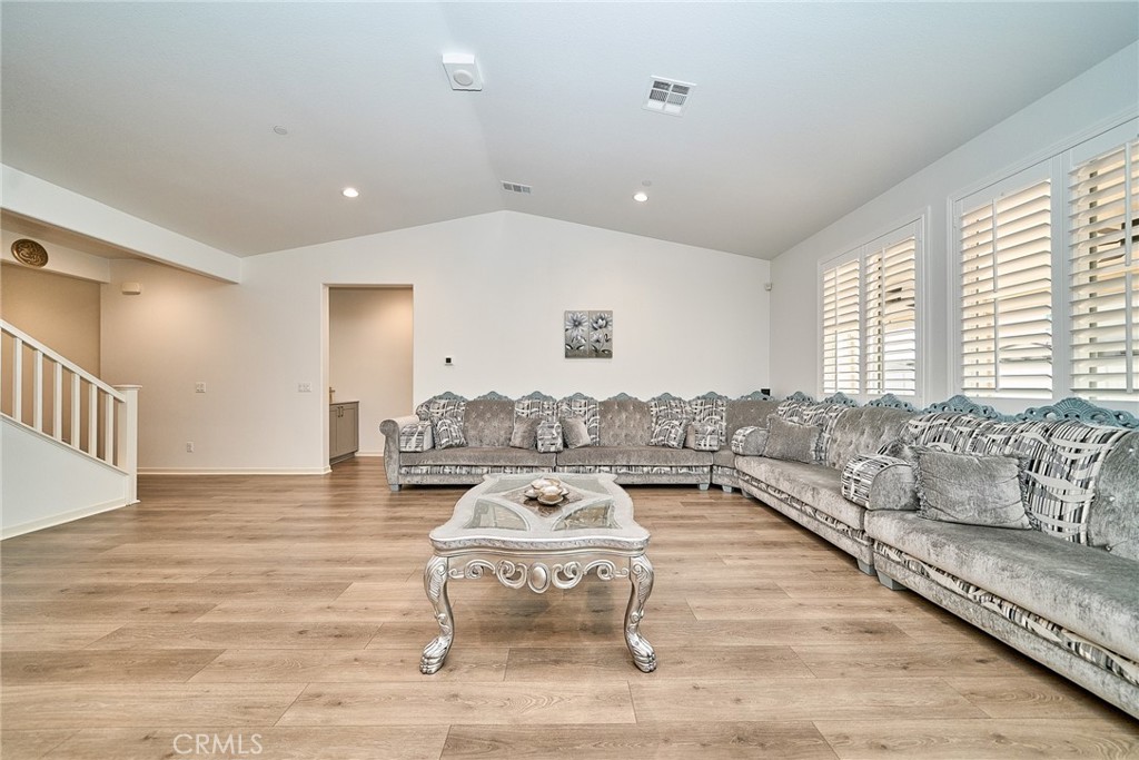 7902 Ravello Court Highland, CA 92346 - Photo 9 of 52 a living room with furniture and a table