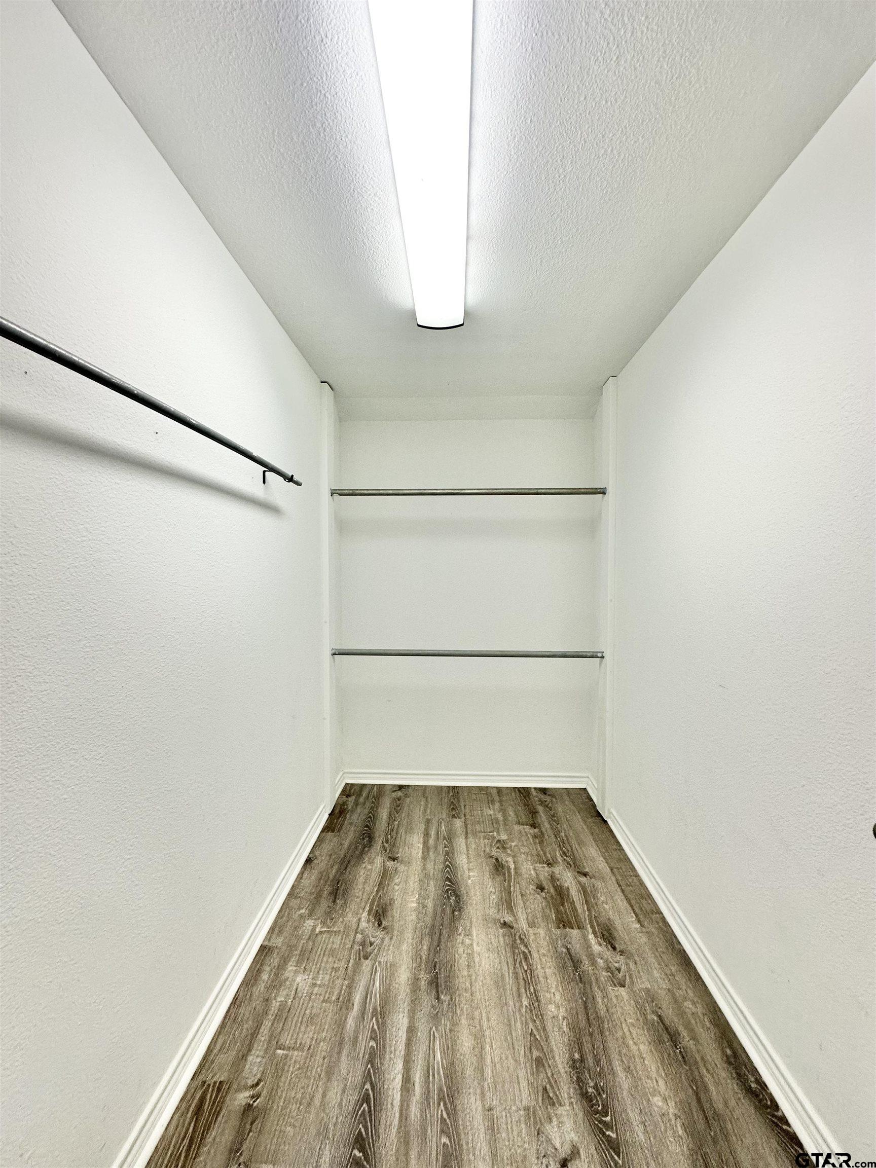 219 Half Street Lindale, TX 75771 - Photo 26 of 33 a view of a small space built with wooden floor