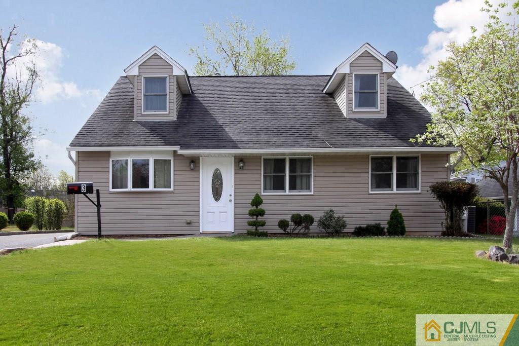 3 Markham Road Edison, NJ 08817 - Photo 2 of 23 a front view of a house with a garden