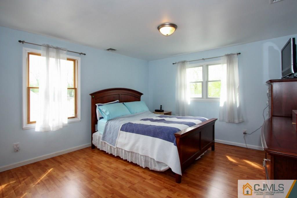3 Markham Road Edison, NJ 08817 - Photo 15 of 23 a bedroom with a bed and a window