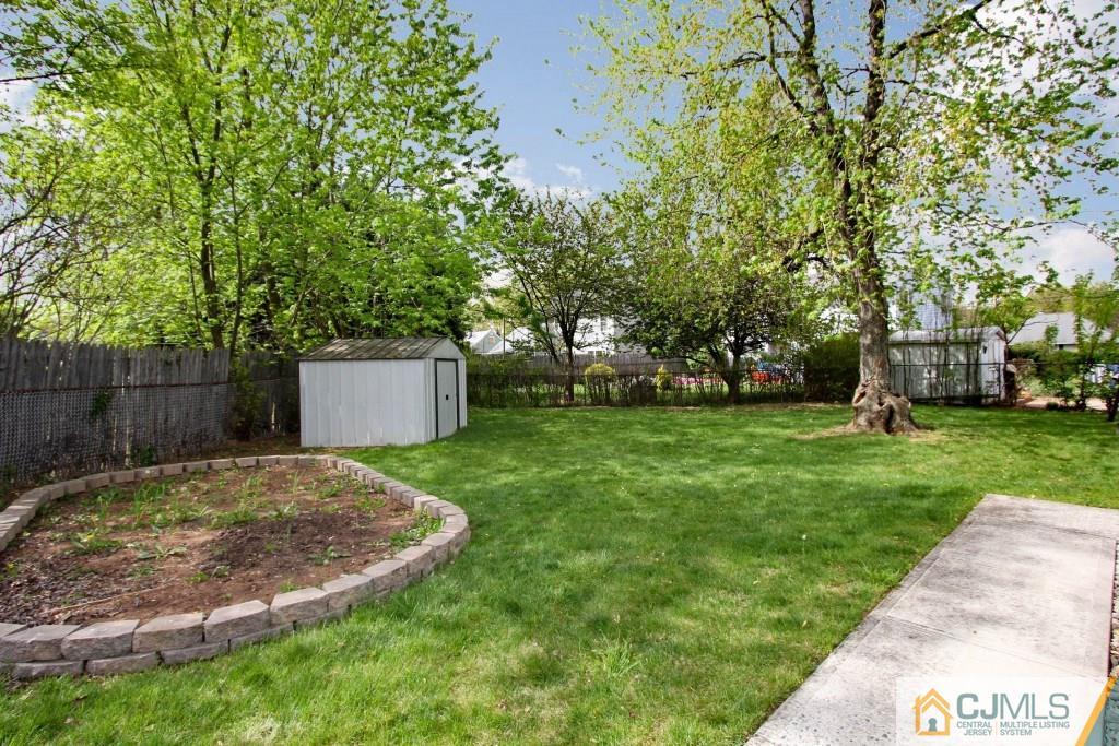 3 Markham Road Edison, NJ 08817 - Photo 23 of 23 a view of a backyard with a garden