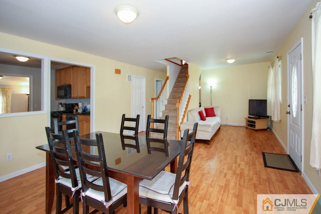 3 Markham Road Edison, NJ 08817 - Photo 5 of 23 a dining room with furniture and wooden floor