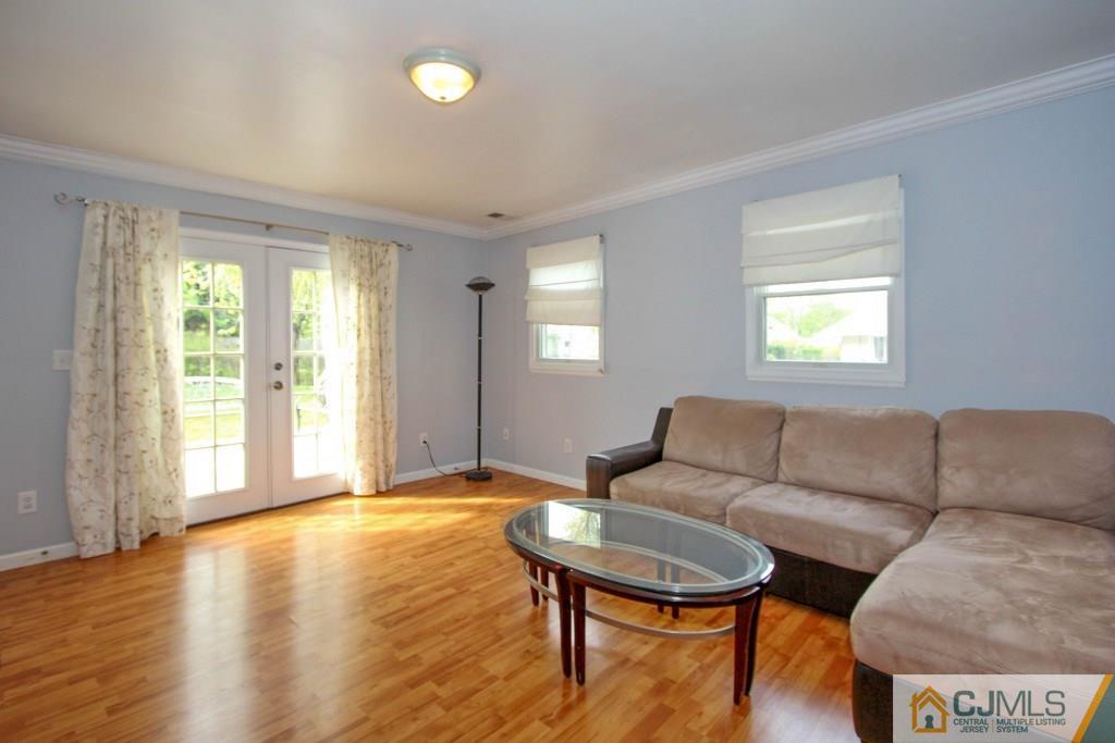 3 Markham Road Edison, NJ 08817 - Photo 10 of 23 a living room with furniture and a large window