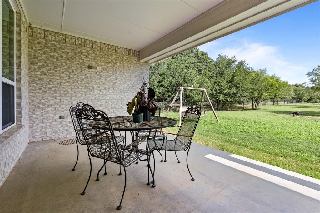 560 Wilson Bend Road Millsap, TX 76066 - Photo 36 of 38 Large, rear covered porch!