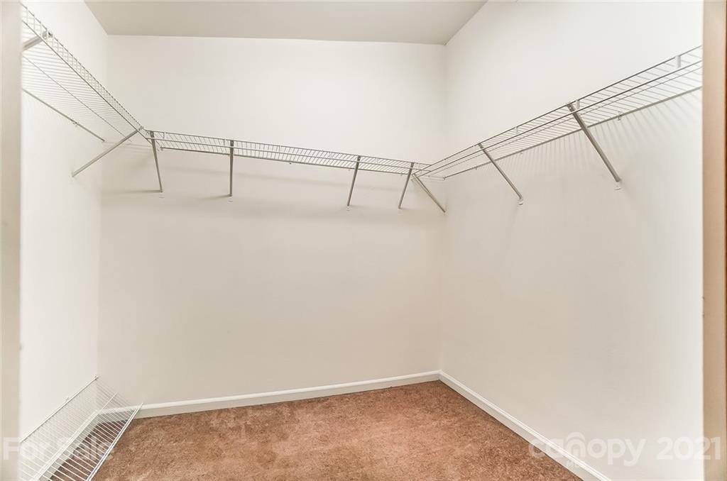 3003 Lowell Road Gastonia, NC 28054 - Photo 14 of 27 a view of a room with racks on the wall