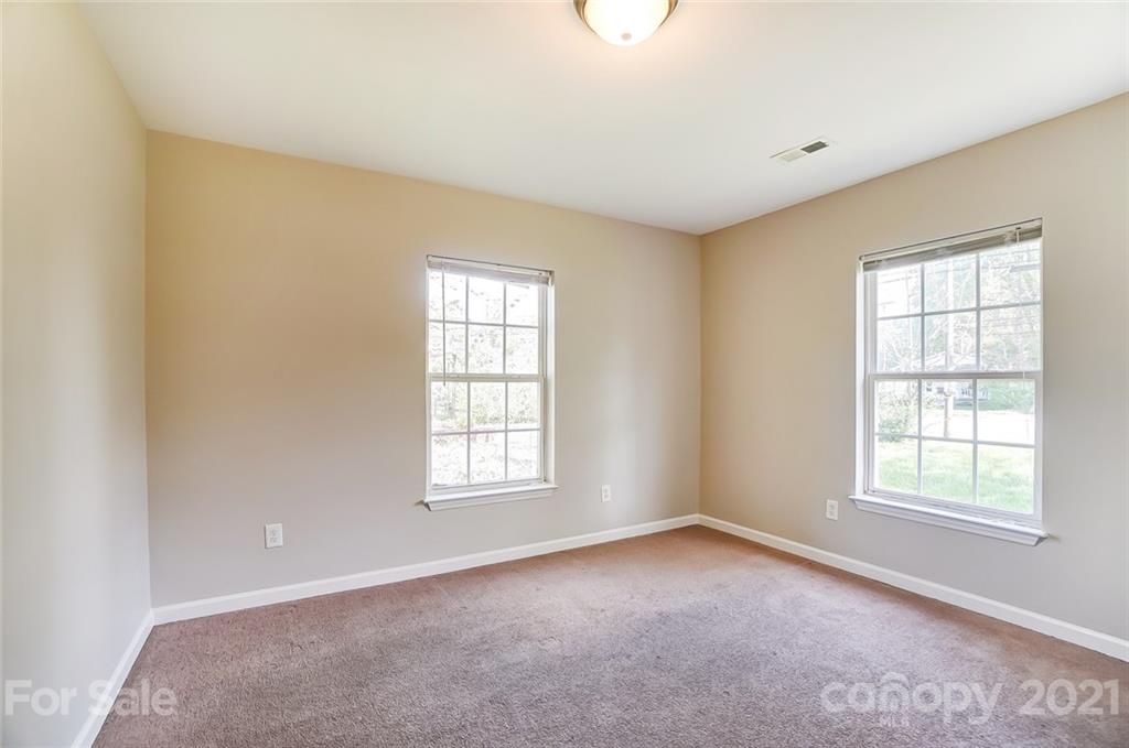3003 Lowell Road Gastonia, NC 28054 - Photo 17 of 27 an empty room with windows