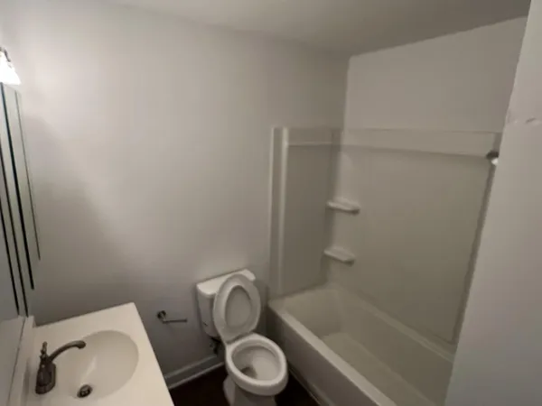 a bathroom with a sink and a toilet