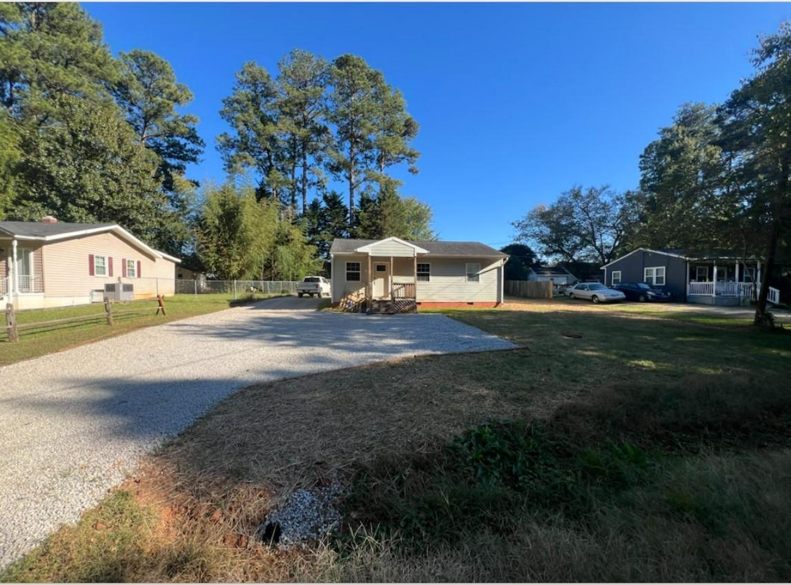 222 Weston Road Garner, NC 27529 - Photo 23 of 27 a house view with a outdoor space