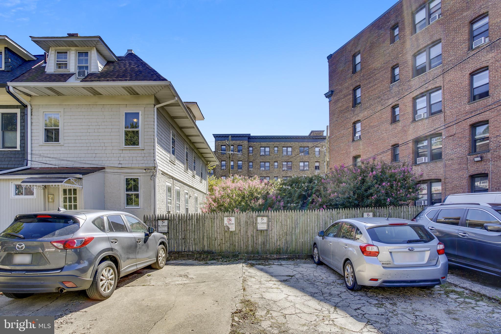 2753 Macomb Street Northwest Washington, DC 20008 - Photo 5 of 90 7 numbered parking spaces. 5 are rented.