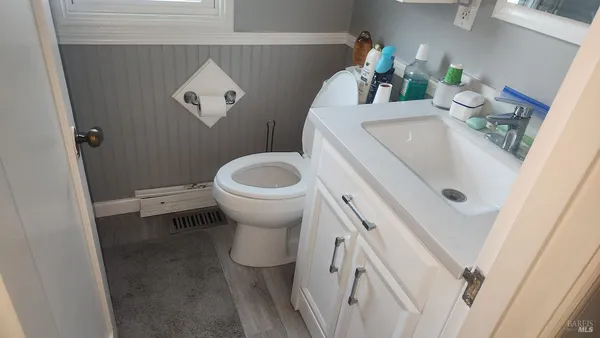 a bathroom with a sink and a toilet