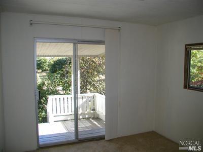 8800 Green Valley Road, Unit 30 Sebastopol, CA 95472 - Photo 6 of 8 Bedroom with Rear Deck
