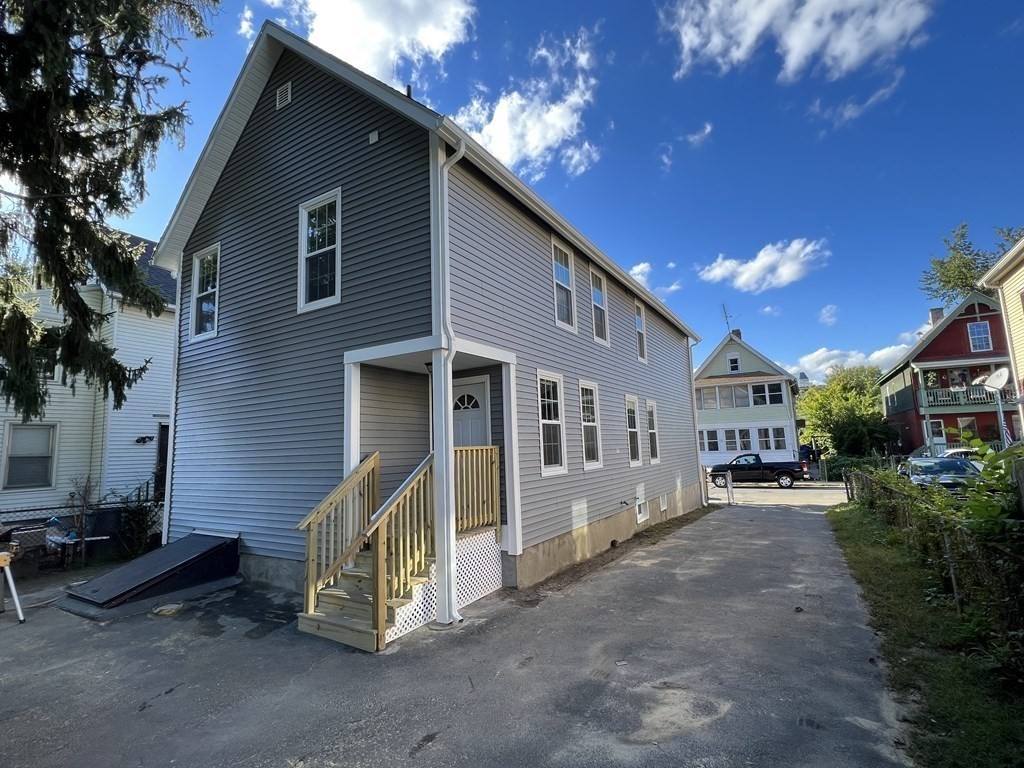 45 Loring Street Springfield, MA 01105 - Photo 3 of 16 a house view with a outdoor space
