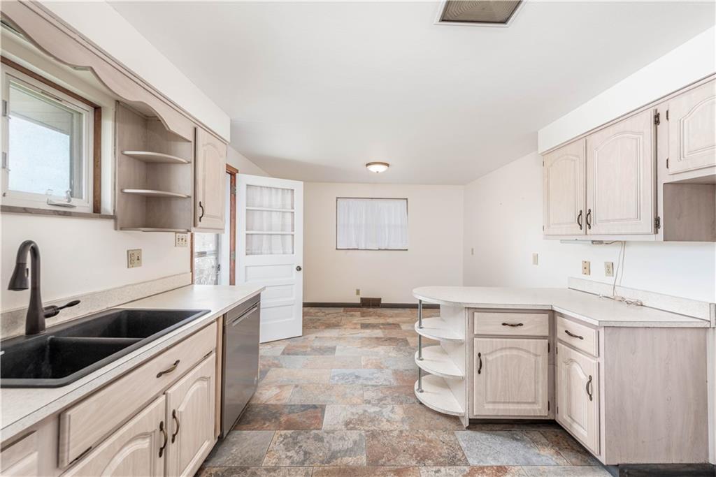 6576 Library Road South Park, PA 15129 - Photo 6 of 31 a kitchen with white cabinets and white appliances