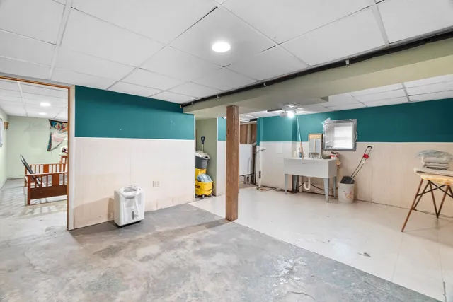 a bed room with furniture and a table