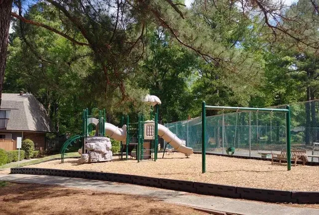 a view of a park with slide