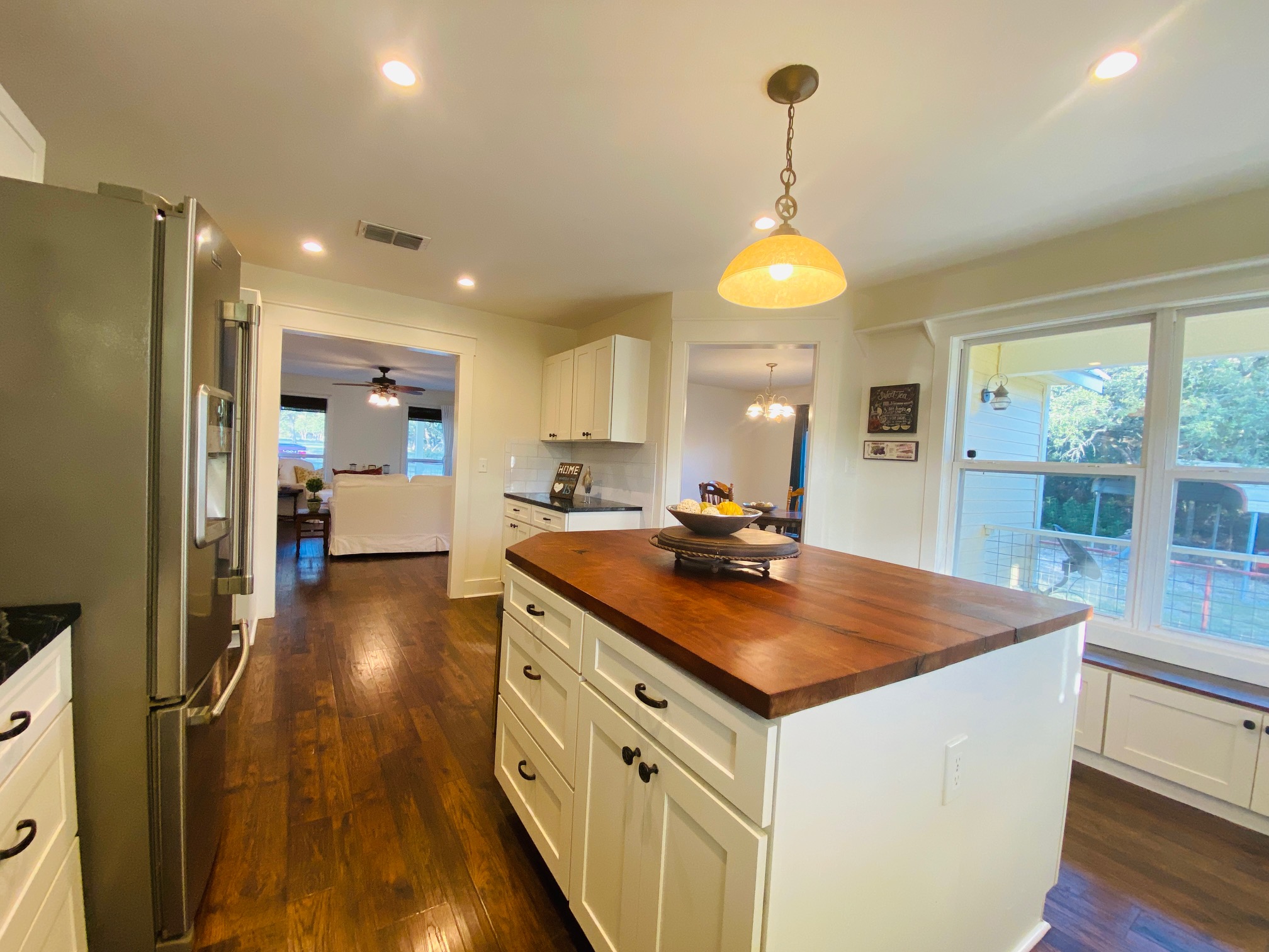 306 Plainview Road Wimberley, TX 78676 - Photo 9 of 29 Lots of storage space and coffee bar in this well lit kitchen.