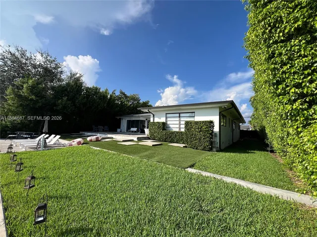 a view of a porch with a yard