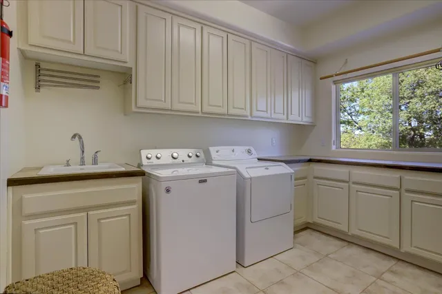 a kitchen with a stove and a sink