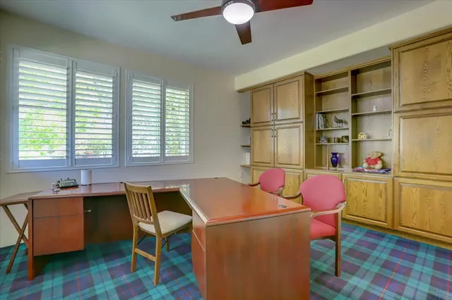 a view of a bathroom with a sink and mirror