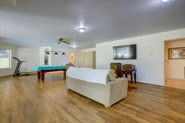 a view of a house with a yard and tree s