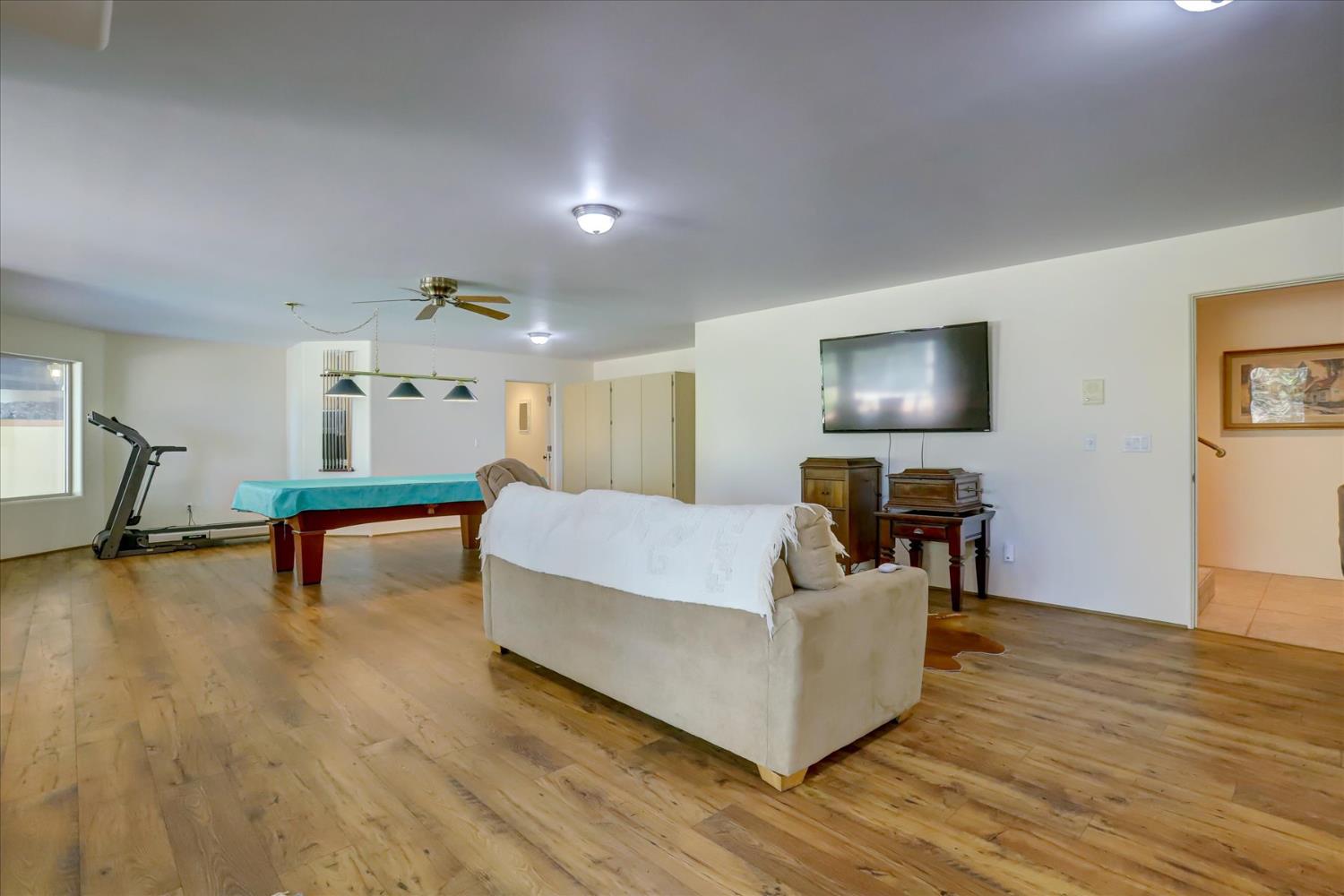 16875 Southridge Road Penn Valley, CA 95946 - Photo 42 of 89 a living room with furniture and a wooden floor
