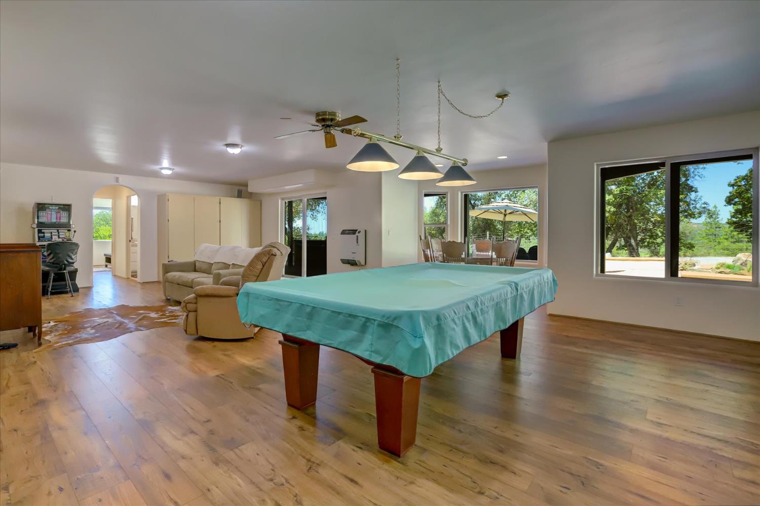 16875 Southridge Road Penn Valley, CA 95946 - Photo 43 of 89 a living room with dining room and wooden floor