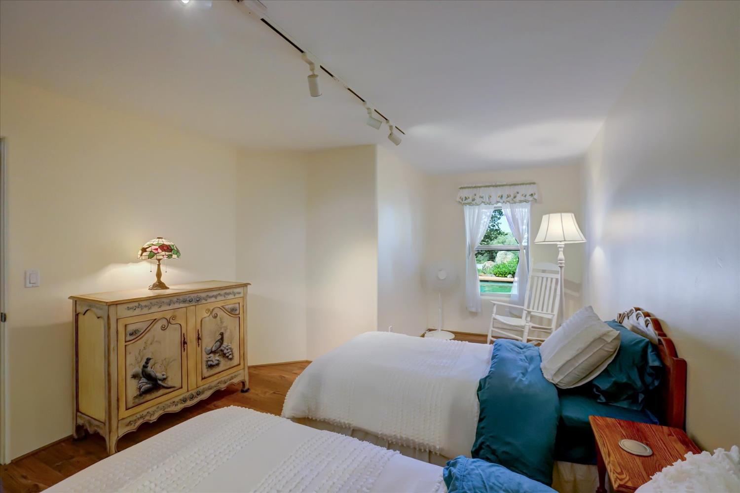 16875 Southridge Road Penn Valley, CA 95946 - Photo 45 of 89 a bedroom with furniture and a window