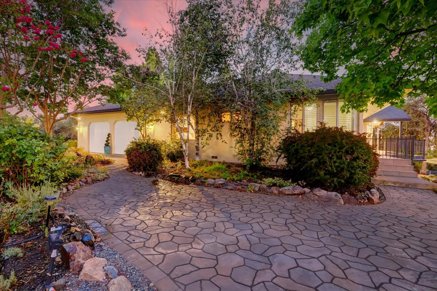 16875 Southridge Road Penn Valley, CA 95946 - Photo 67 of 89 a view of a backyard with potted plants and large trees