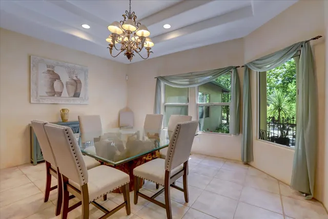a kitchen with stainless steel appliances granite countertop a stove and a microwave