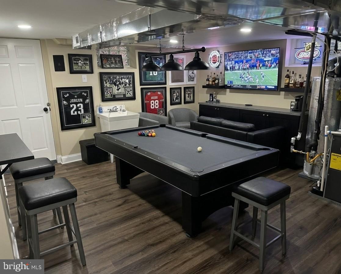 4433 Old Frederick Road Baltimore, MD 21229 - Photo 16 of 37 Stylish game room with sports memorabilia.(Staged)