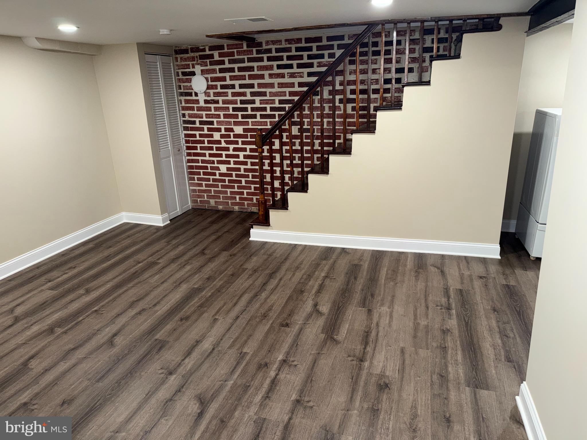 4433 Old Frederick Road Baltimore, MD 21229 - Photo 17 of 37 Spacious basement with charming brick accents.