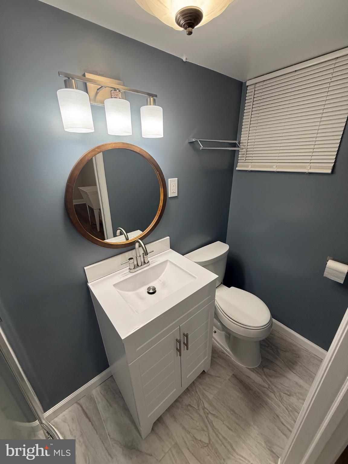4433 Old Frederick Road Baltimore, MD 21229 - Photo 21 of 37 Modern full bathroom with sleek design elements.