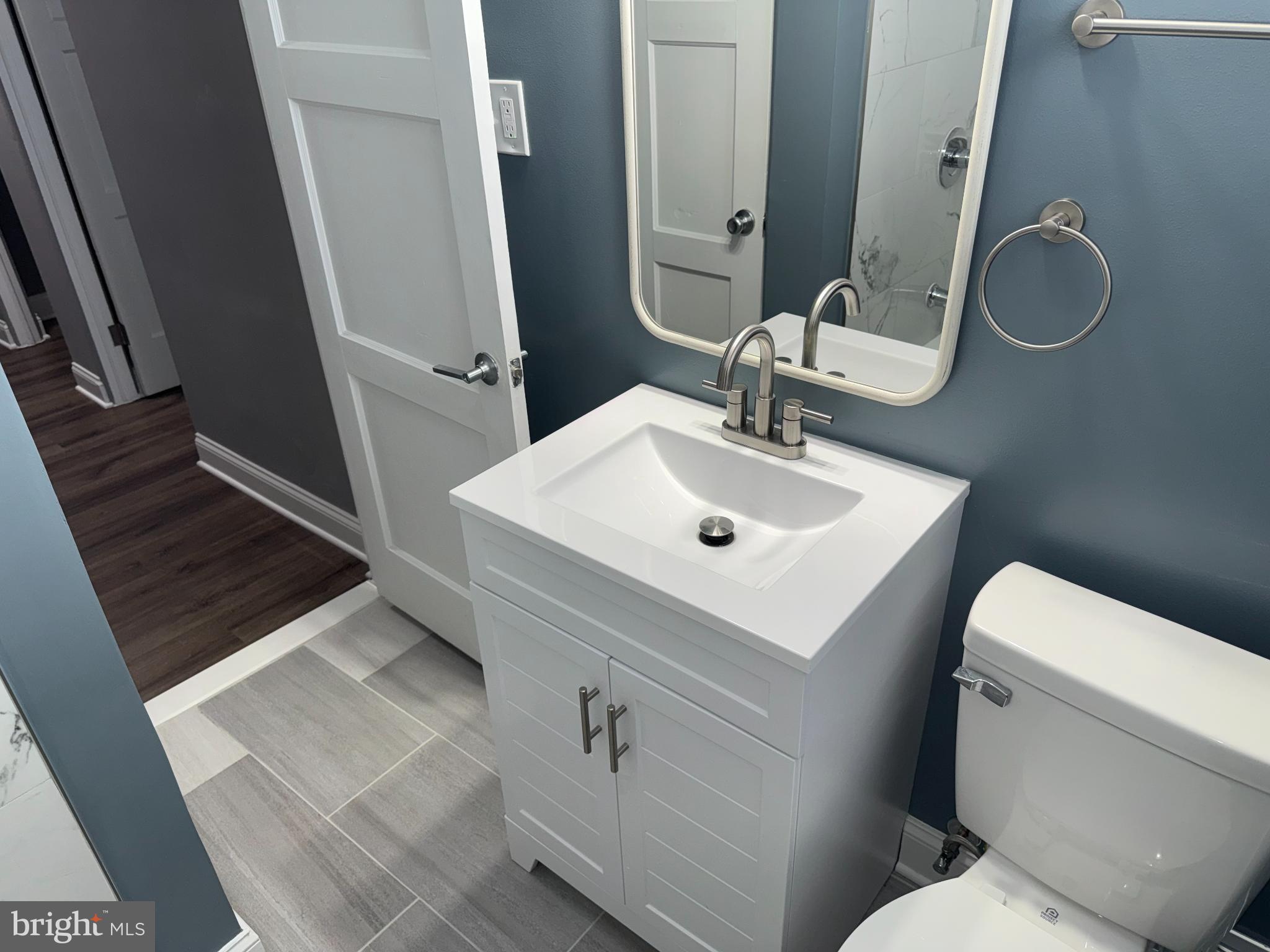 4433 Old Frederick Road Baltimore, MD 21229 - Photo 24 of 37 Modern bathroom with sleek design elements.