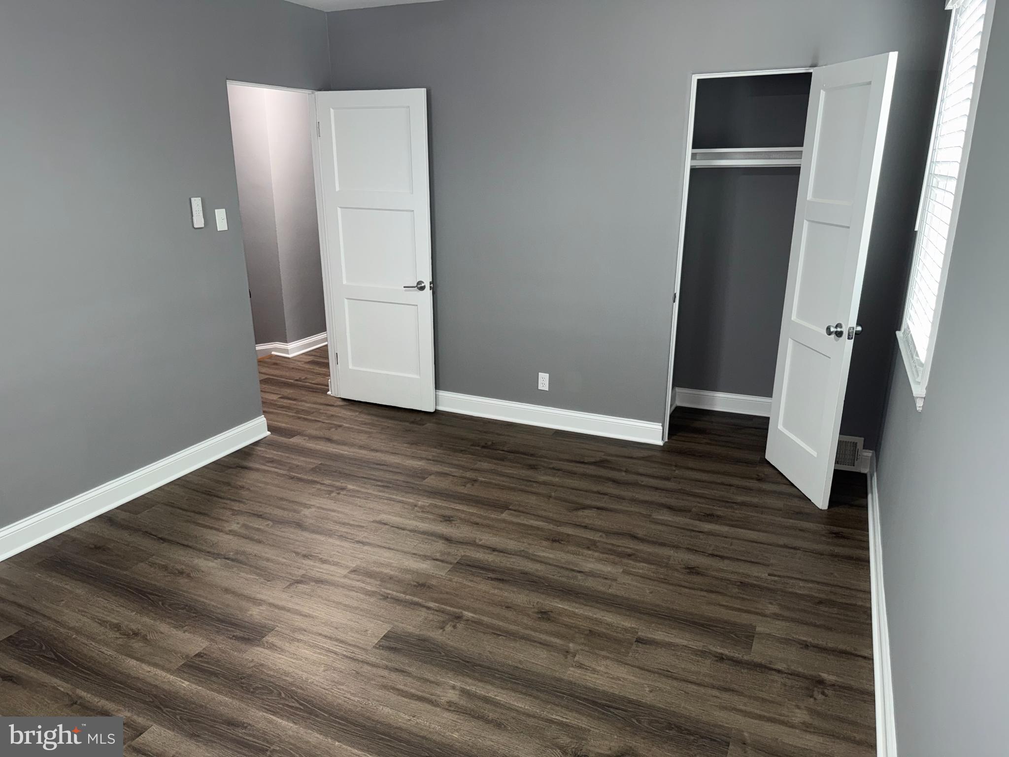 4433 Old Frederick Road Baltimore, MD 21229 - Photo 27 of 37 Spacious room (1 with modern gray tones.