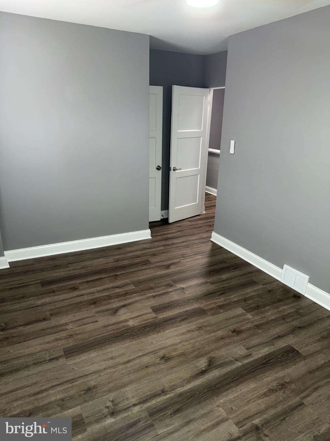 4433 Old Frederick Road Baltimore, MD 21229 - Photo 29 of 37 Spacious room (2 with modern gray tones.