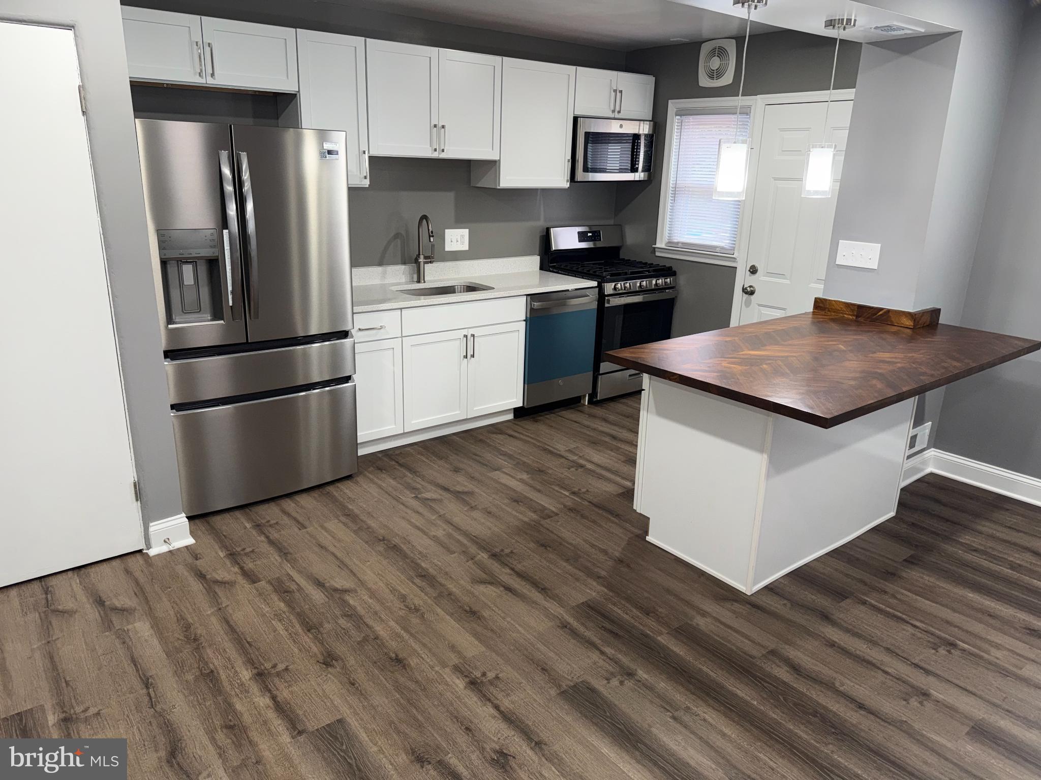 4433 Old Frederick Road Baltimore, MD 21229 - Photo 3 of 37 Modern kitchen with sleek finishes.