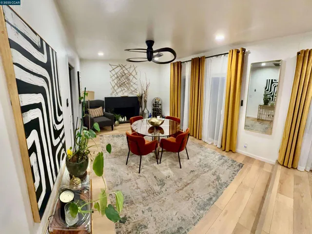 a view of a livingroom with furniture and a rug