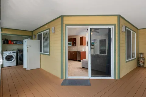 a living room with furniture and window