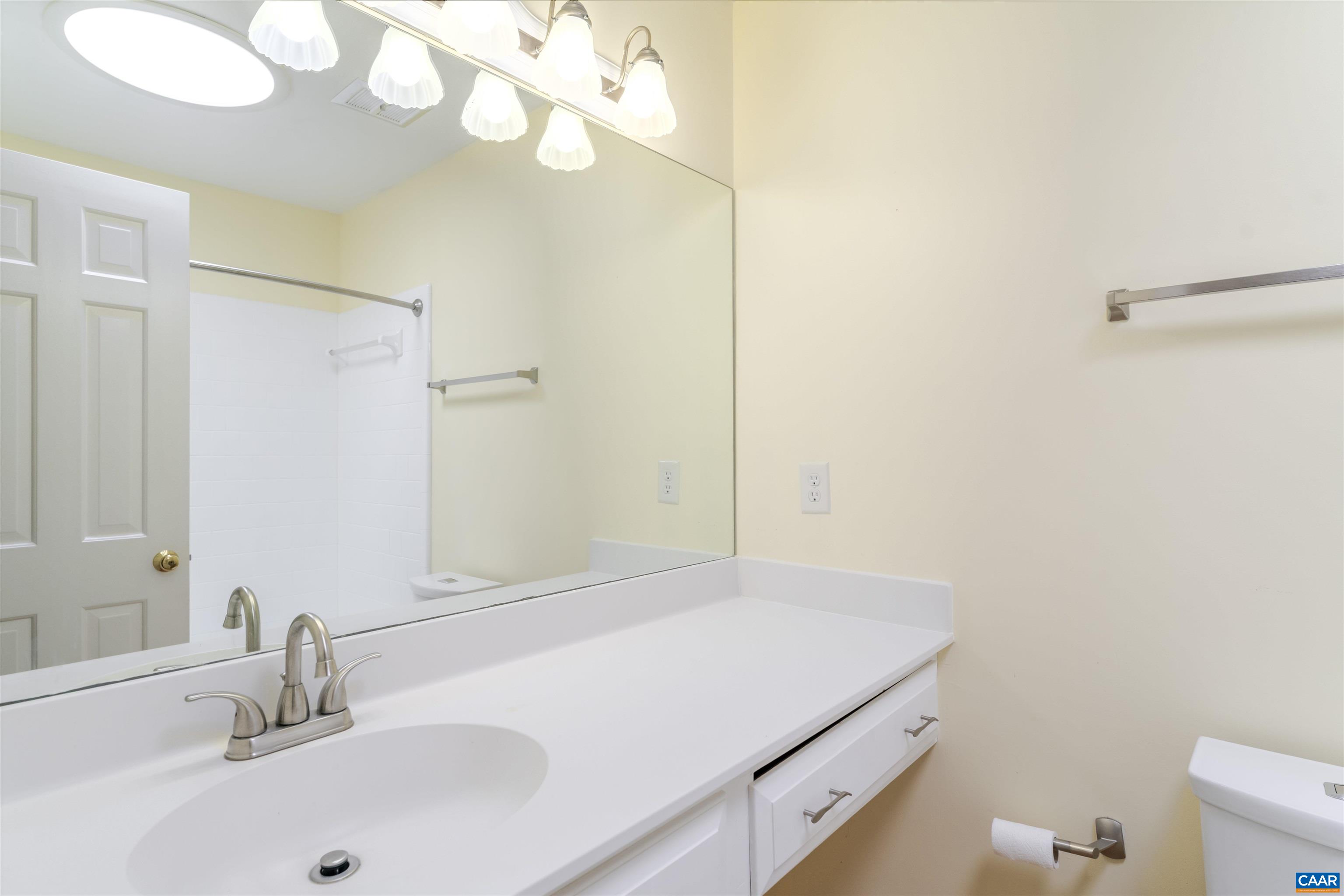 207 Surrey Road Charlottesville, VA 22901 - Photo 16 of 38 Sizable full bathroom with another large solar tube for natural light!