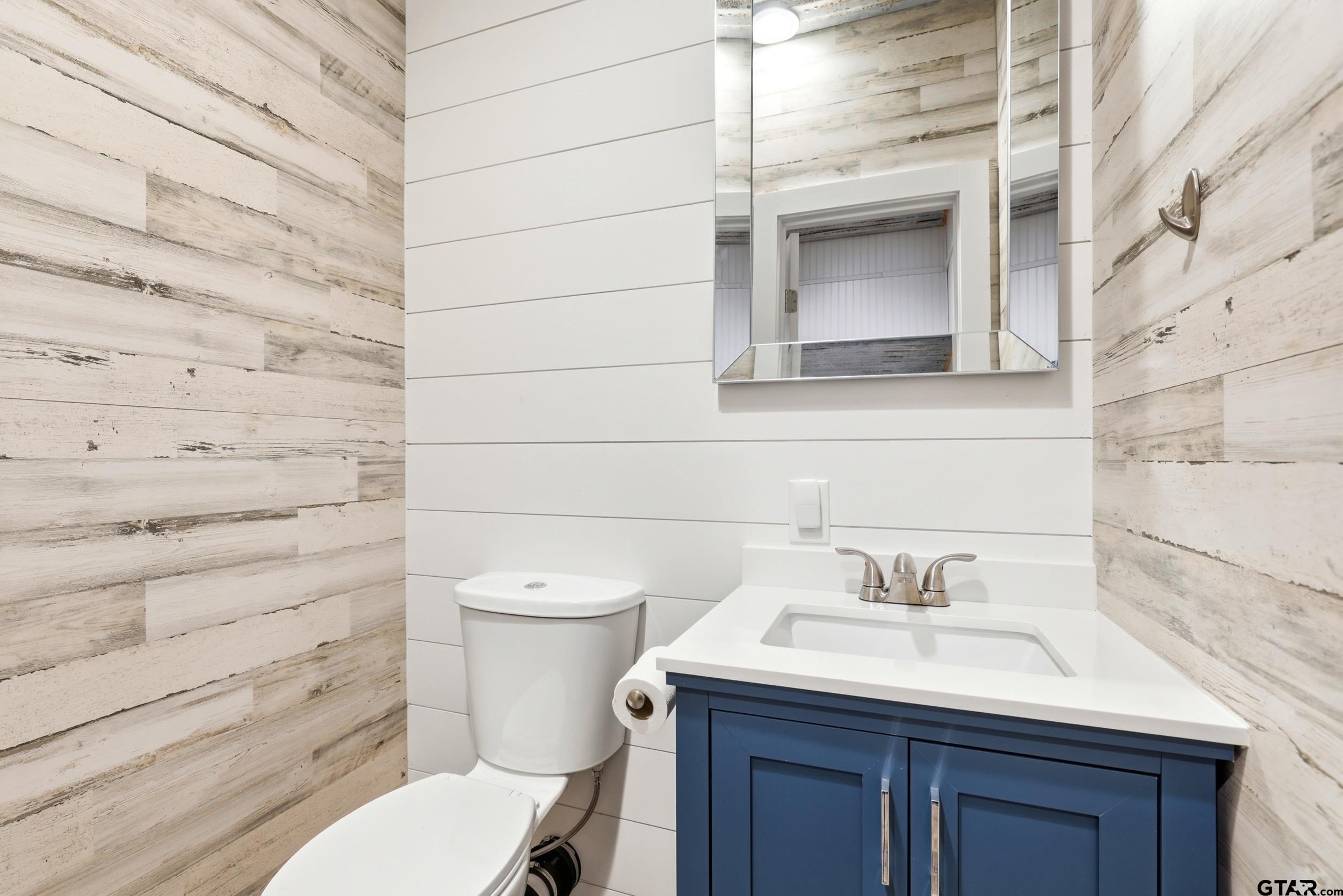 132 King George Road Scroggins, TX 75480 - Photo 13 of 35 a bathroom with a sink and a toilet