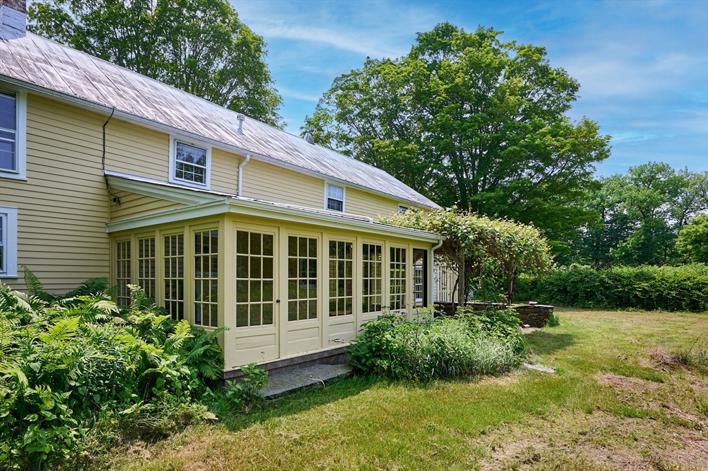 55 Falls Road Sunderland, MA 01375 - Photo 5 of 42 a view of a house with a yard