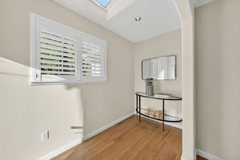 a view of workspace with wooden floor