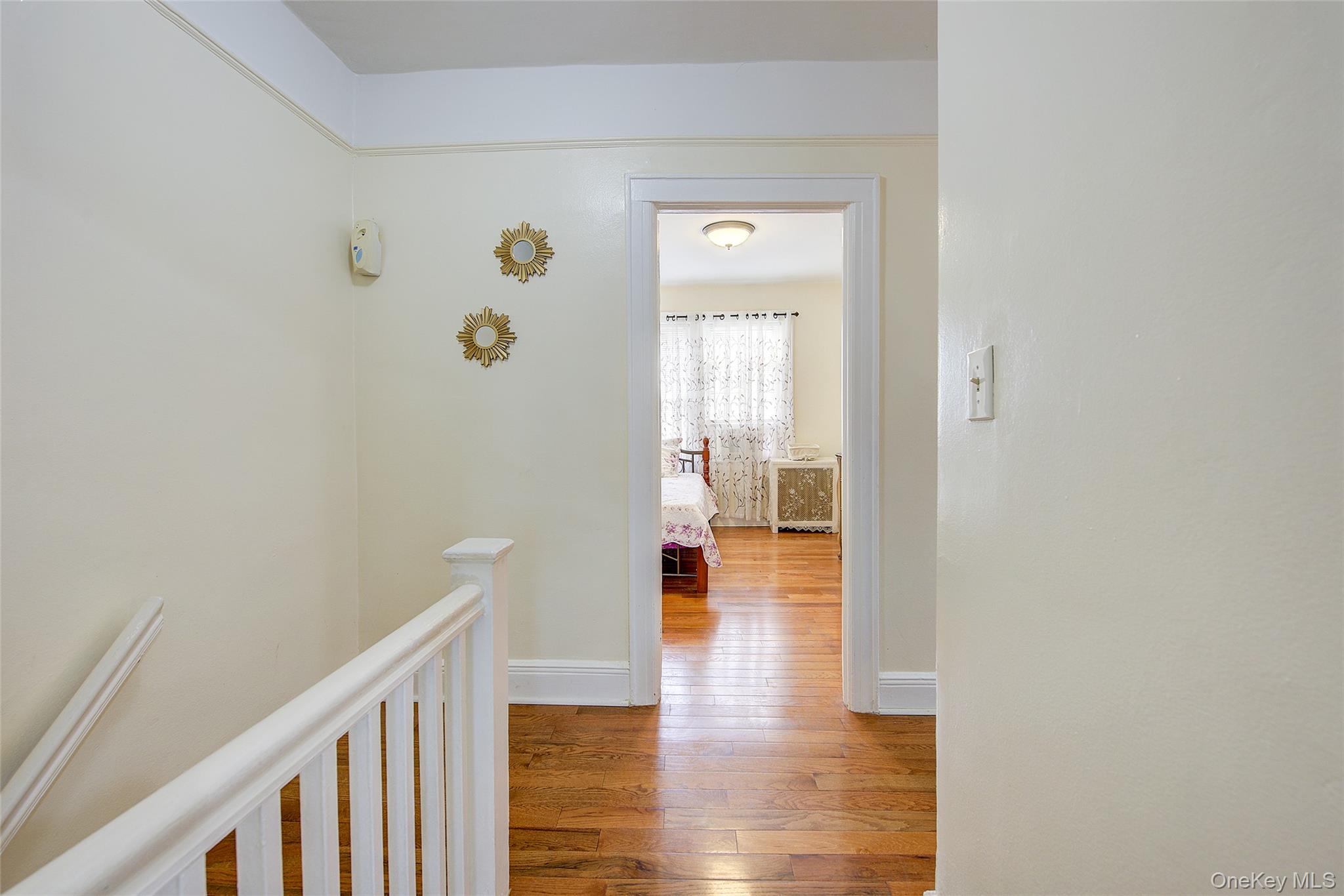 161-10 84th Road Queens, NY 11432 - Photo 28 of 44 a view of hallway with wooden floor