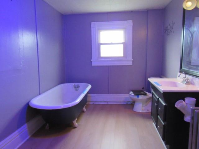 103 Memorial Street Dunbar, PA 15431 - Photo 11 of 18 a bathroom with a sink a toilet and a mirror