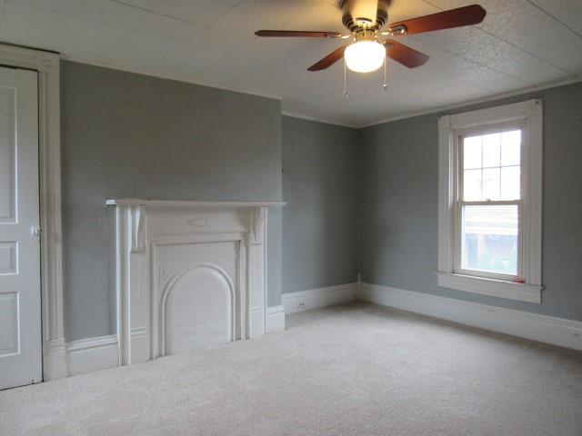 103 Memorial Street Dunbar, PA 15431 - Photo 14 of 18 an empty room with closet and a chandelier fan